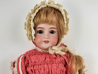 Lot 1033 - HEUBACH KOPPELSDORF, BISQUE HEAD SOCKET DOLL