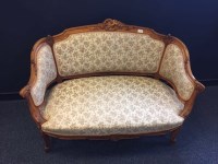Lot 823 - VICTORIAN BEECH FRAMED LOVE SEAT with carbed...