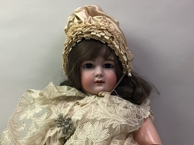 Lot 1034 - LARGE BISQUE HEAD SOCKET DOLL