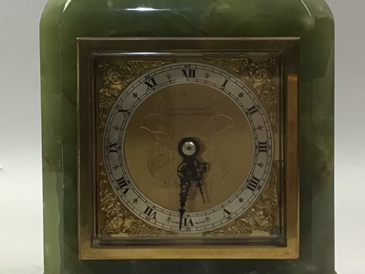 Lot 657 - BRASS AND ONYX MANTEL CLOCK