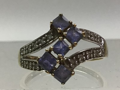 Lot 762 - IOLIGHT NINE CARAT GOLD AND DIAMOND RING