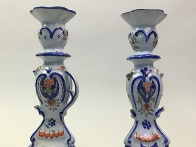 Lot 34 - TWO PAIRS OF FRENCH FAIENCE POTTERY CANDLESTICKS