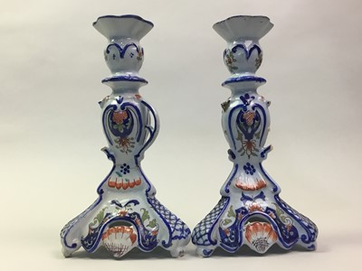 Lot 34 - TWO PAIRS OF FRENCH FAIENCE POTTERY CANDLESTICKS