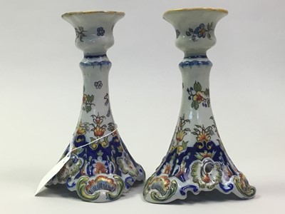 Lot 34 - TWO PAIRS OF FRENCH FAIENCE POTTERY CANDLESTICKS