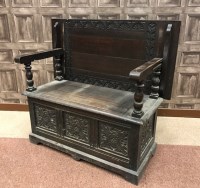 Lot 876 - EARLY 20TH CENTURY OAK MONKS BENCH the hinged...