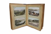 Lot 897 - EARLY 20TH CENTURY POSTCARD ALBUM comprising...