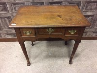 Lot 923 - EARLY GEORGE III OAK LOWBOY with central...