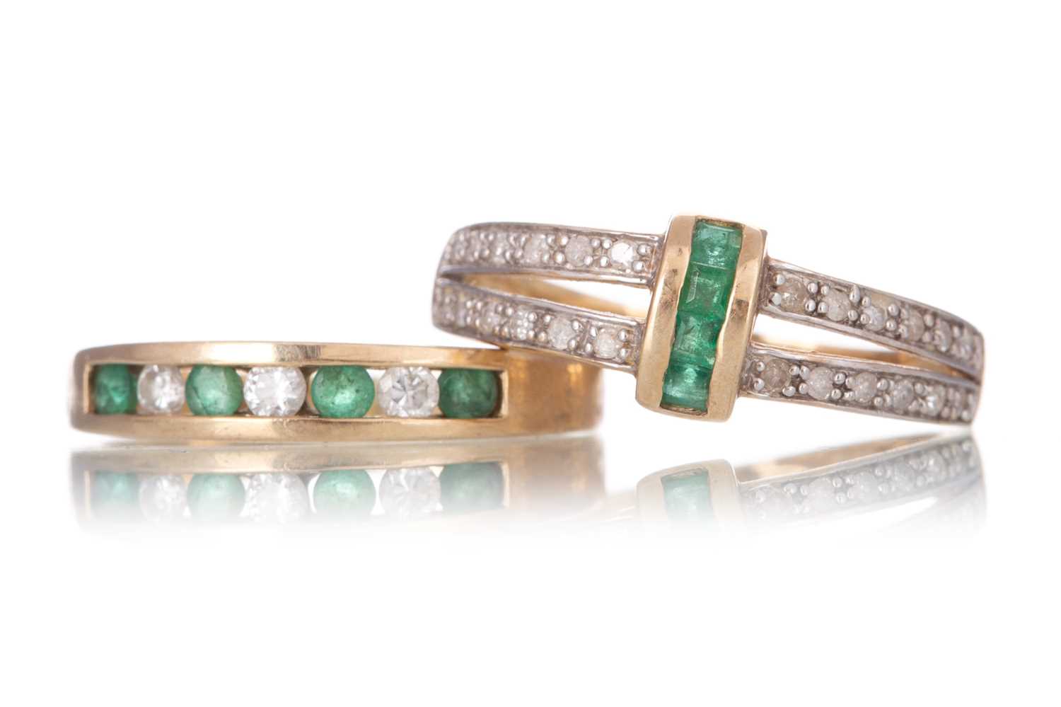 Lot 1175 - TWO EMERALD AND DIAMOND RINGS