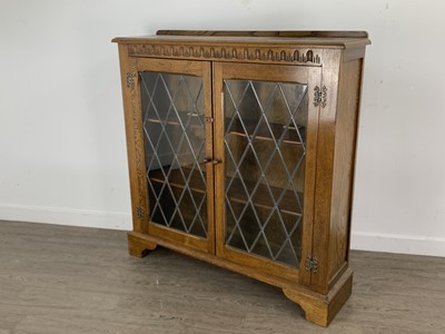 Lot 241 - OAK TWO DOOR BOOKCASE