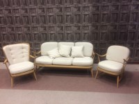 Lot 965 - ERCOL BEECH LOUNGE SUITE comprising a three...