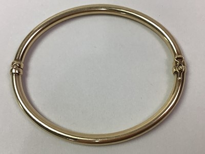 Lot 652 - GOLD BANGLE AND A BRACELET