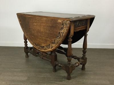 Lot 529 - CARVED OAK GATELEG TABLE