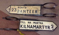 Lot 991 - SET OF FOUR IRISH REPUBLIC CAST IRON BILINGUAL...