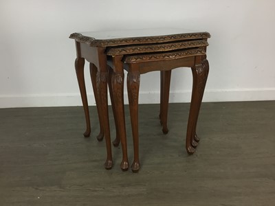 Lot 595 - WALNUT NEST OF THREE TABLES