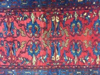 Lot 994 - BOKHARA HAND-WOVEN RUG with two rows of...