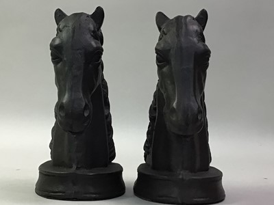 Lot 670 - PAIR OF CAST METAL BOOKENDS