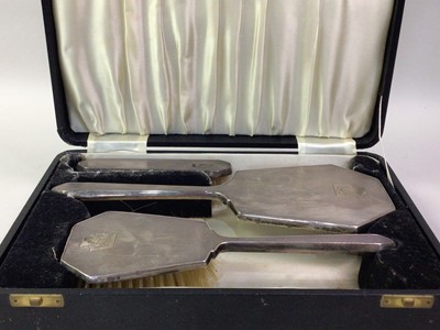 Lot 723 - SILVER THREE PIECE DRESSING TABLE SET