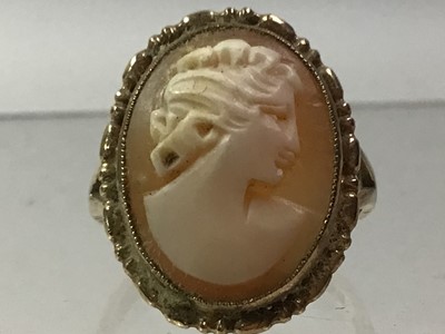 Lot 755 - NINE CARAT GOLD CAMEO RING