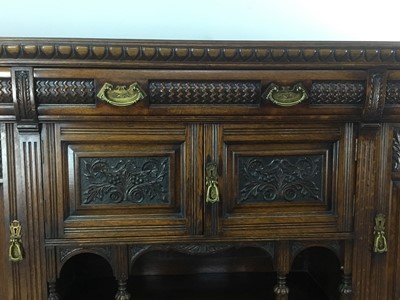 Lot 100 - VICTORIAN CARVED OAK SIDEBOARD