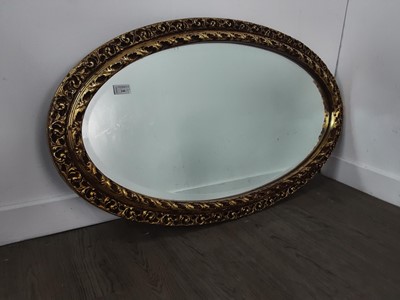 Lot 240 - OVAL GILT WALL MIRROR