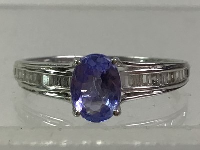 Lot 187 - TANZANITE AND DIAMOND DRESS RING