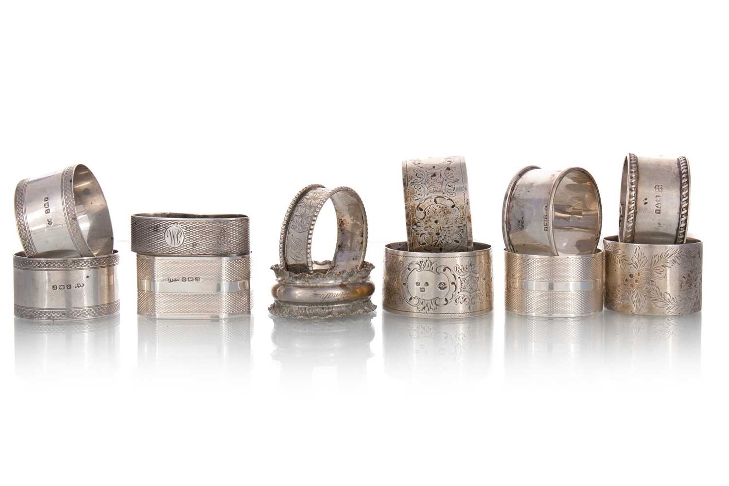 Lot 158 - TWELVE SILVER NAPKIN RINGS