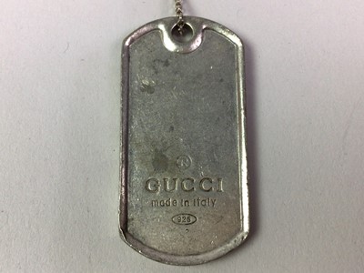 Lot 331 - WHITE METAL DOG TAG PENDANT