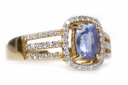 Lot 19 - SAPPHIRE AND DIAMOND DRESS RING set with an...