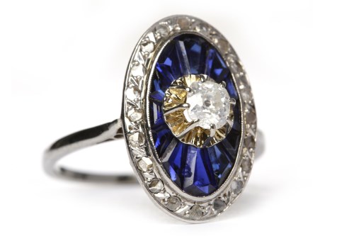 Lot 28 - ART DECO SAPPHIRE AND DIAMOND RING of oval...