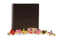 Lot 41 - LOUIS VUITTON RING AND BARETTE SET the acrylic...