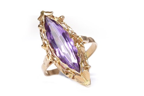 Lot 44 - RUSSIAN AMETHYST SET RING the marquise shaped...