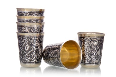 Lot 169 - SET OF SIX RUSSIAN NIELLO SILVER AND PARCEL GILT BEAKERS