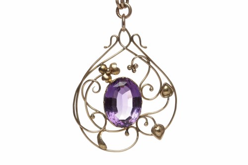 Lot 77 - LARGE AMETHYST SET PENDANT openwork and of...
