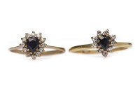 Lot 79 - TWO SAPPHIRE AND DIAMOND CLUSTER RINGS each...