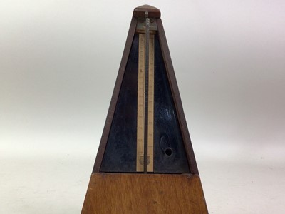 Lot 149 - WALNUT METRONOME