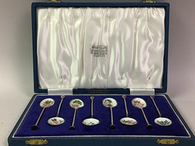 Lot 334 - SET OF EIGHT SILVER AND ENAMEL COFFEE SPOONS