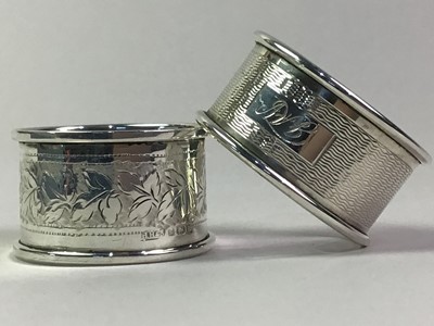 Lot 329 - GROUP OF SEVEN SILVER NAPKIN RINGS