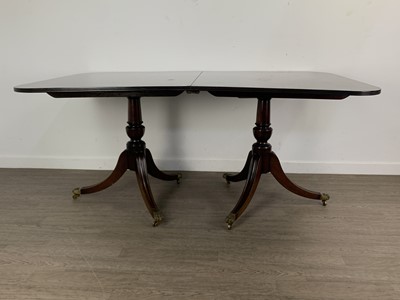 Lot 259 - TWIN REPRODUCTION MAHOGANY PEDESTAL EXTENDING DINING TABLE