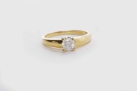 Lot 108 - DIAMOND SOLITAIRE RING the four claw set round...