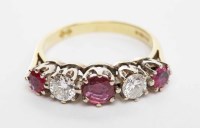 Lot 112 - RUBY AND DIAMOND FIVE STONE RING set with...