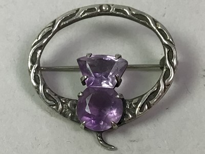 Lot 424 - AMETHYST THISTLE SILVER BROOCH BY ROBERT ALISON.