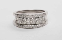 Lot 120 - UNUSUAL DIAMOND RING formed by an outer...
