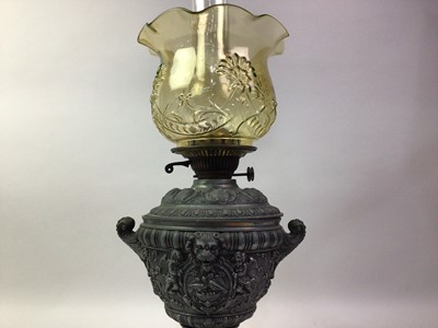 Lot 688 - CAST METAL OIL LAMP