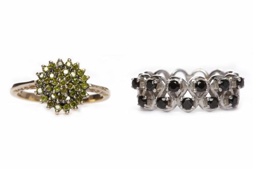 Lot 191 - SILVER GEM SET RING the broad pierced and...