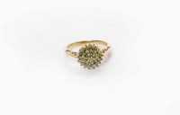 Lot 191A - GREEN DIAMOND CLUSTER RING the round bezel set...