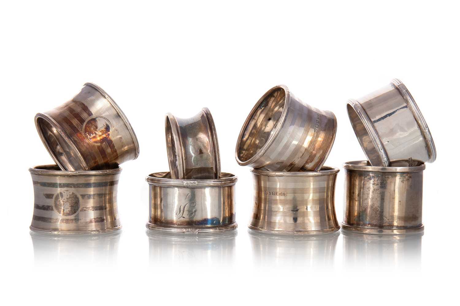Lot 75 - SET OF FOUR SILVER NAPKIN RINGS