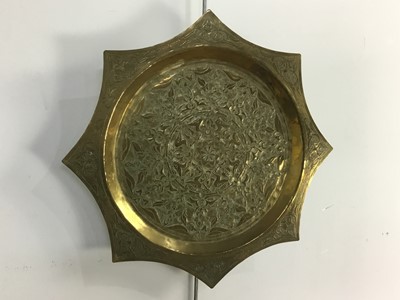 Lot 56 - THREE PERSIAN / ISLAMIC BRASS CHARGERS AND AN OCCASIONAL TABLE