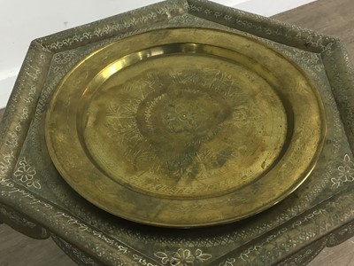 Lot 56 - THREE PERSIAN / ISLAMIC BRASS CHARGERS AND AN OCCASIONAL TABLE