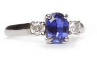 Lot 242 - PLATINUM SAPPHIRE AND DIAMOND RING the central...
