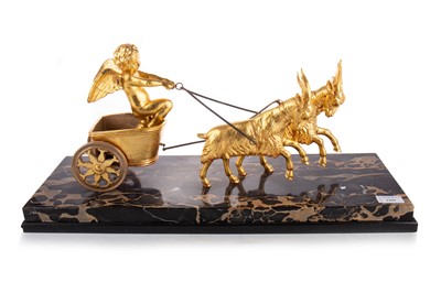 Lot 1294 - GILT METAL FIGURE GROUP OF A PUTTO CHARIOT RIDER